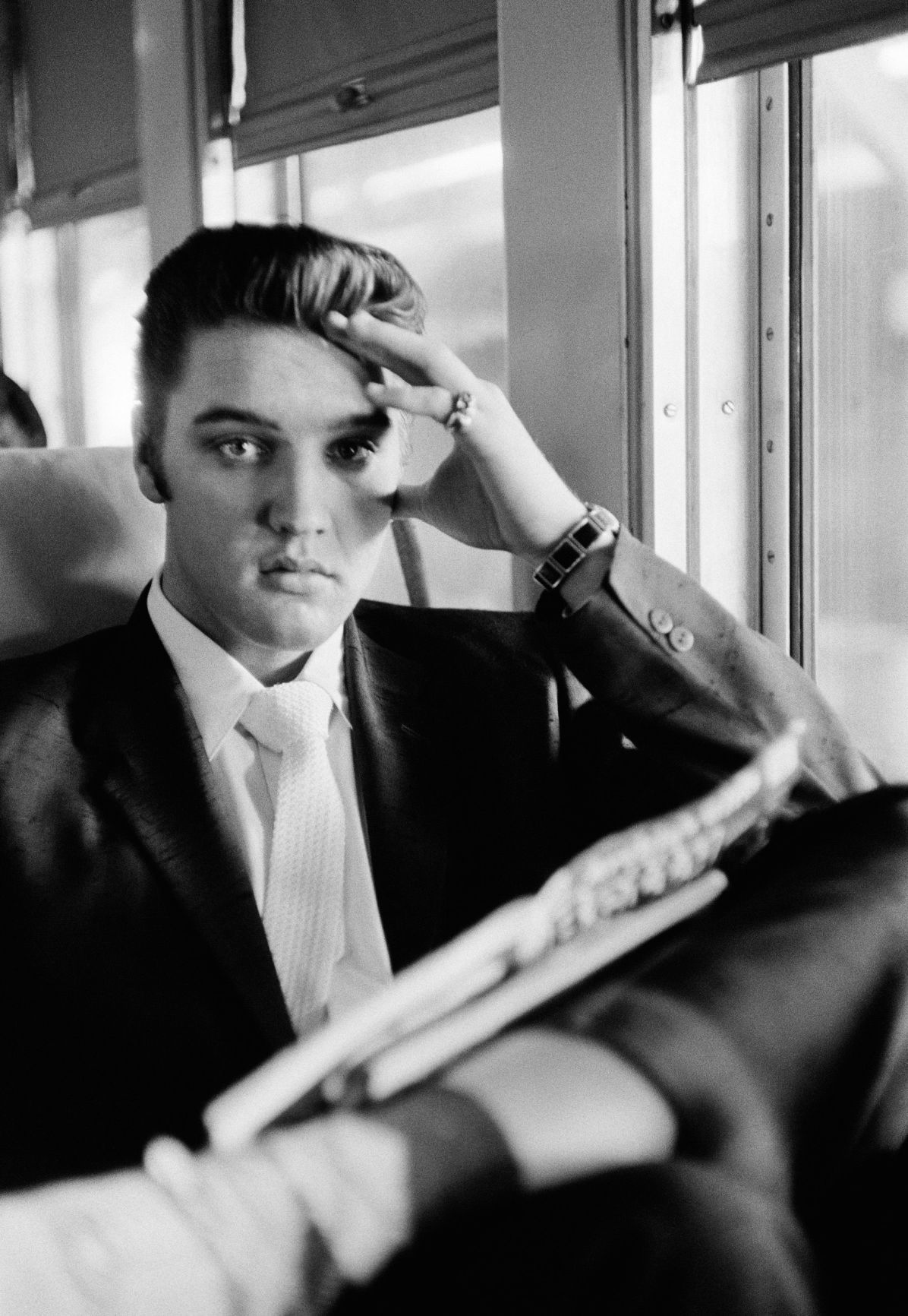 Young Elvis by window